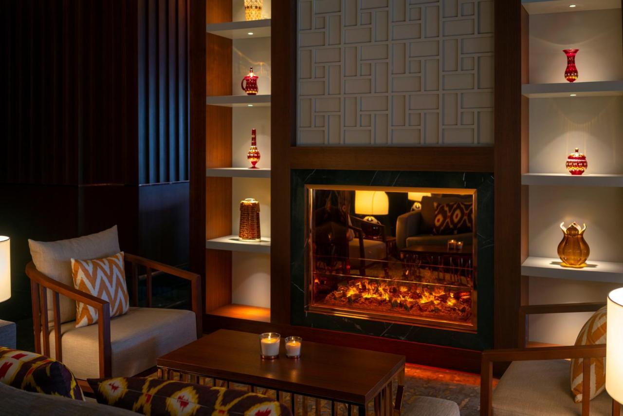 Moevenpick Hotel Istanbul Asia Airport Eksteriør bilde The fireplace at the lobby